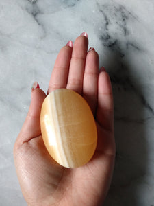 Orange Calcite Palm Stone